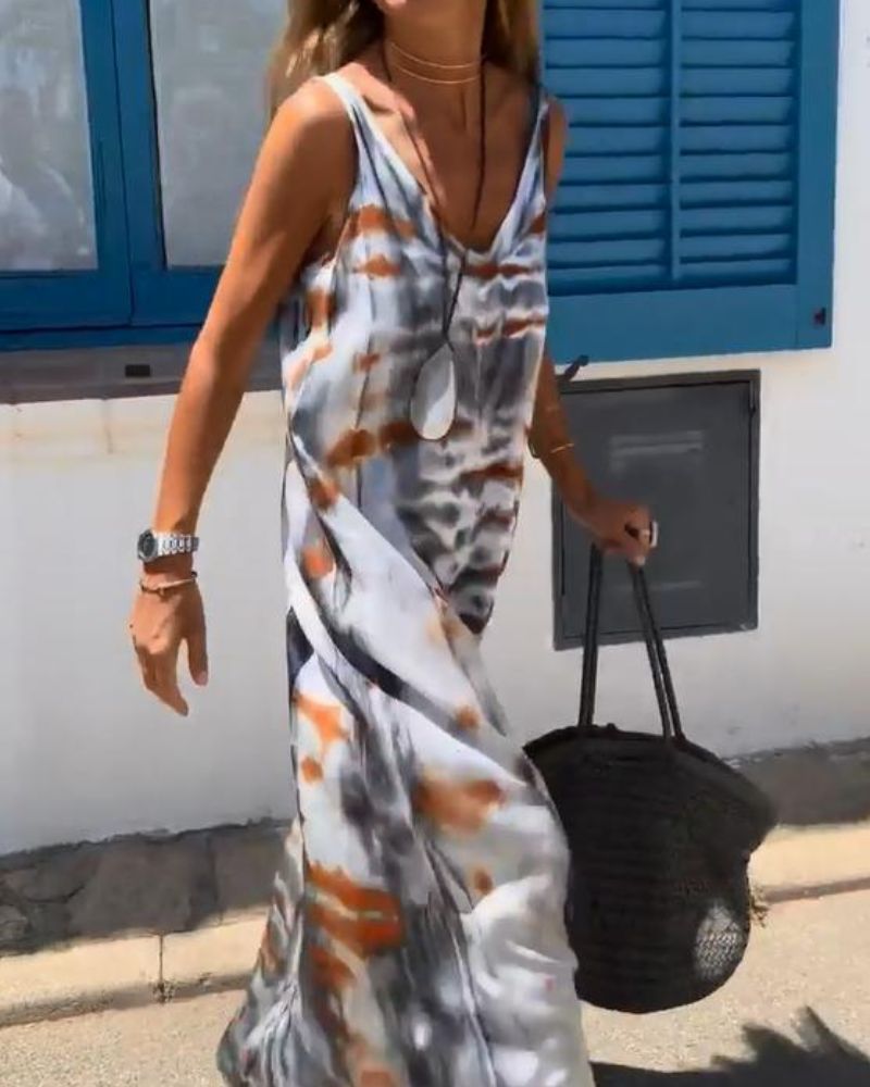 Riya– Sleeveless tie-dye print dress
