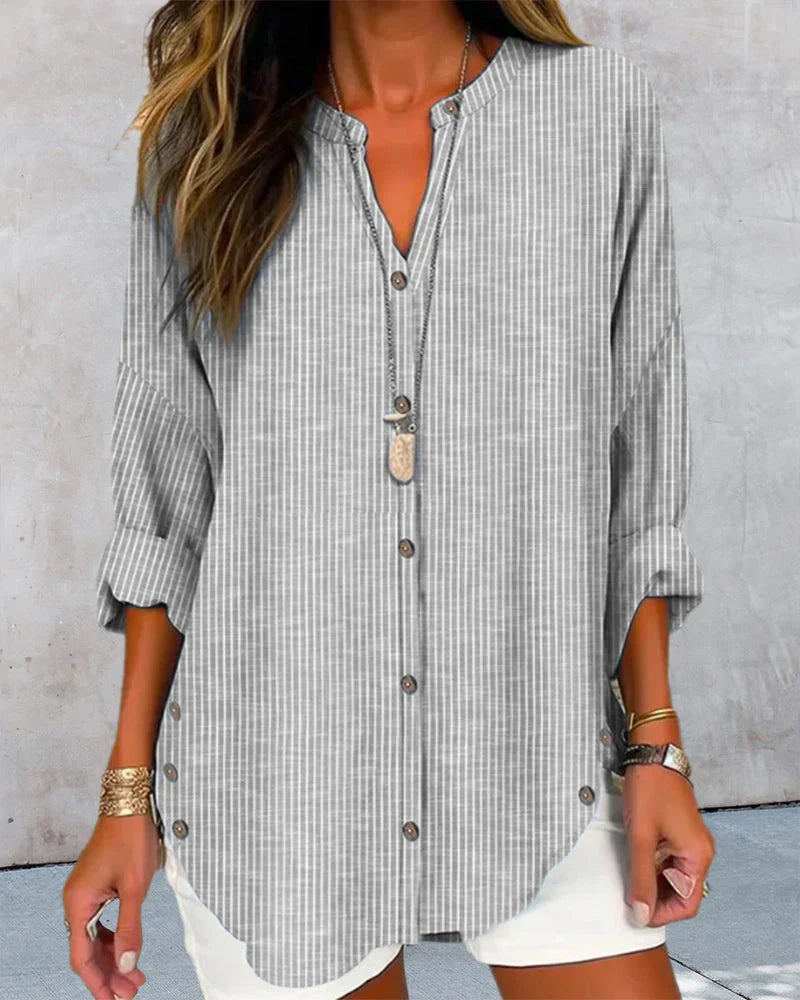 Carla– Elegant V-neck top with timeless stripe pattern