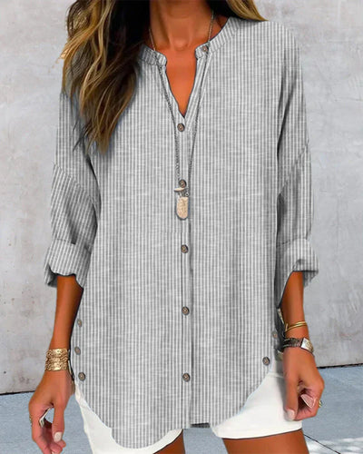 Carla– Elegant V-neck top with timeless stripe pattern