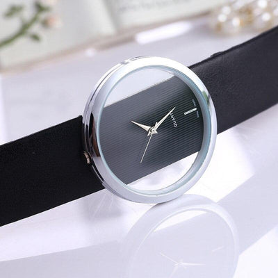 Elegant quartz watch with transparent dial